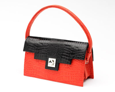 Quoin Medium Handbag in red with black flap