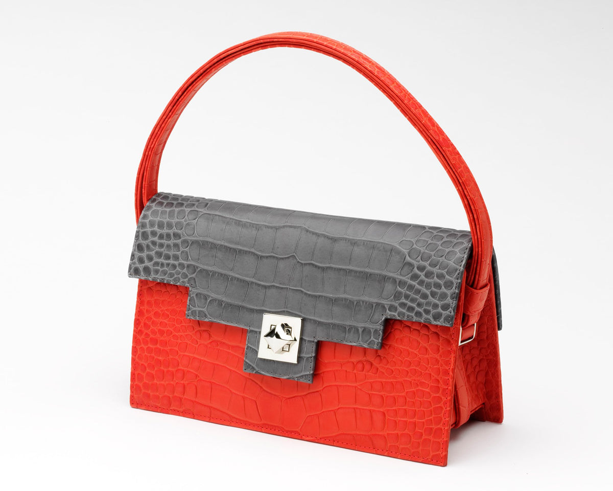 Quoin Medium Handbag in red with grey flap