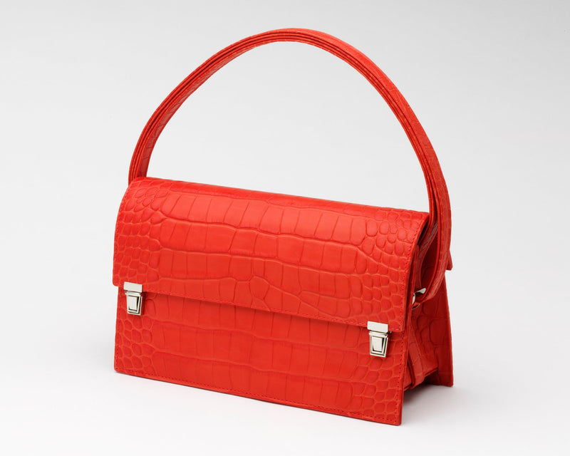Front of Quoin Medium Handbag in red