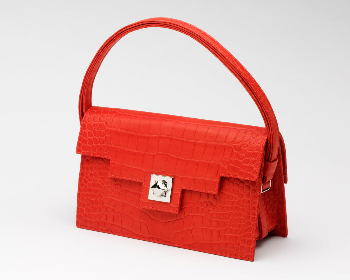 Front of Quoin Medium Handbag in red